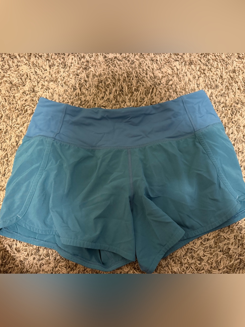 Women’s teal lululemon speed up shorts